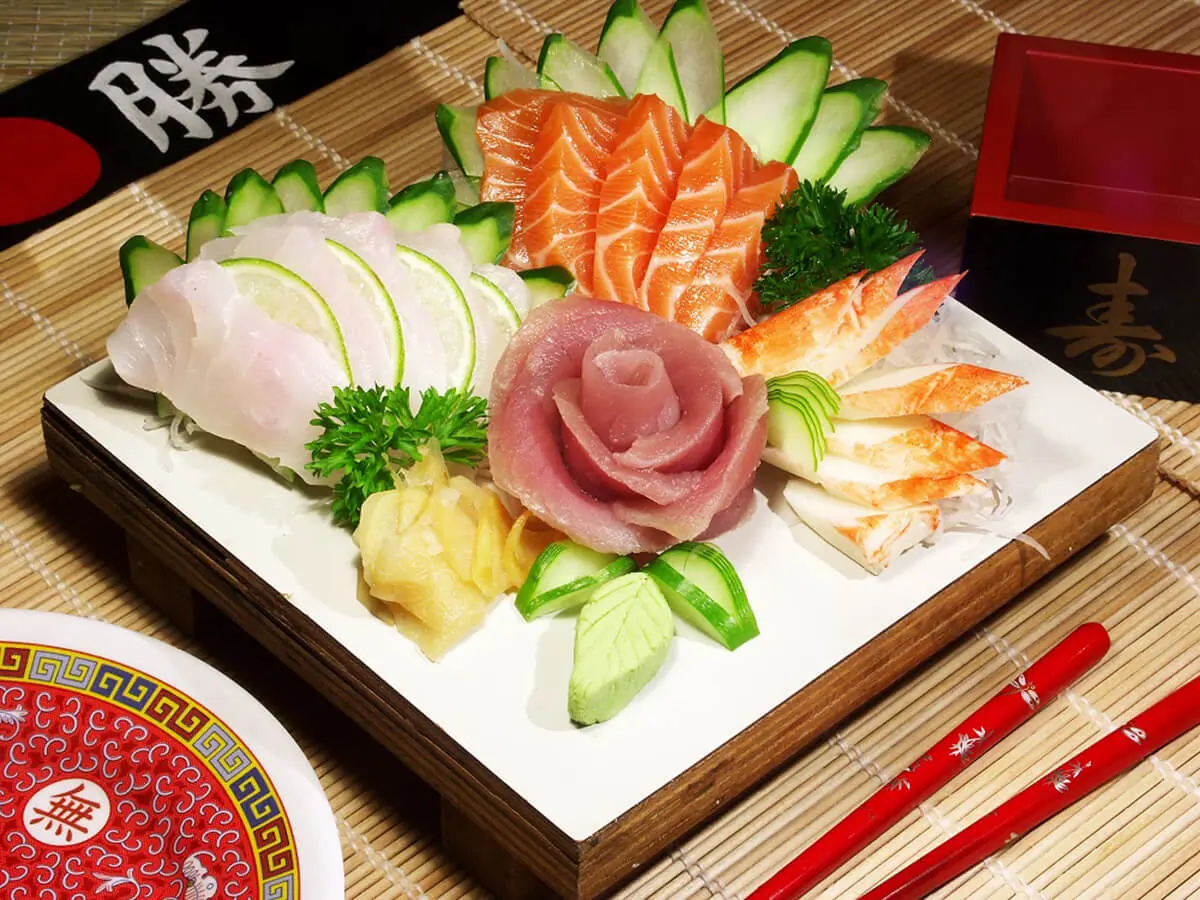 Sushi Sashimi Plate features a selection of sushi and sashimi at Sumo Sushi Hibachi, a Japanese restaurant in Daytona Beach